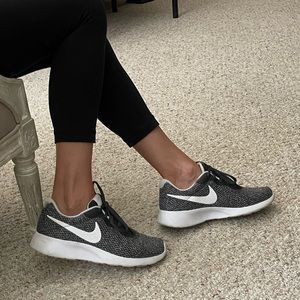 Nike running shoes. Gray and white.